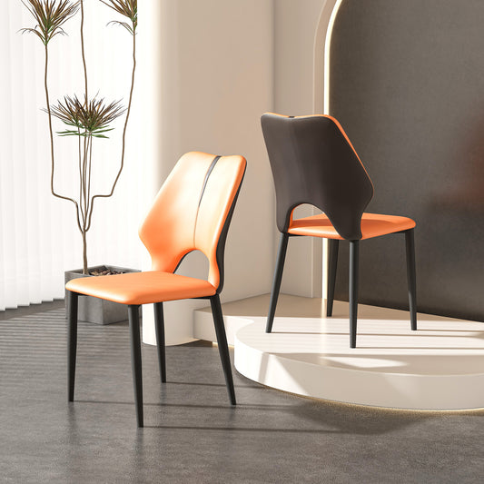 Modern dining chair with orange faux leather seat and black backrest ideal for contemporary kitchens