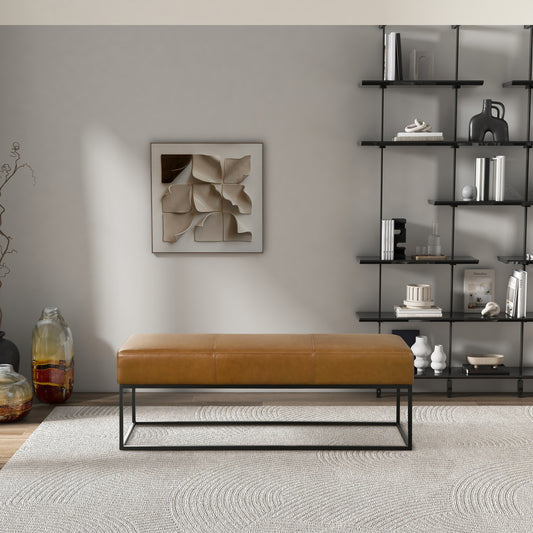 Tan leather bench with stitch detail and black metal frame for modern living rooms