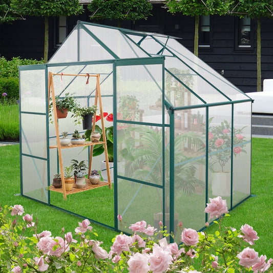 Compact green polycarbonate greenhouse with wooden plant stand ideal for small gardens