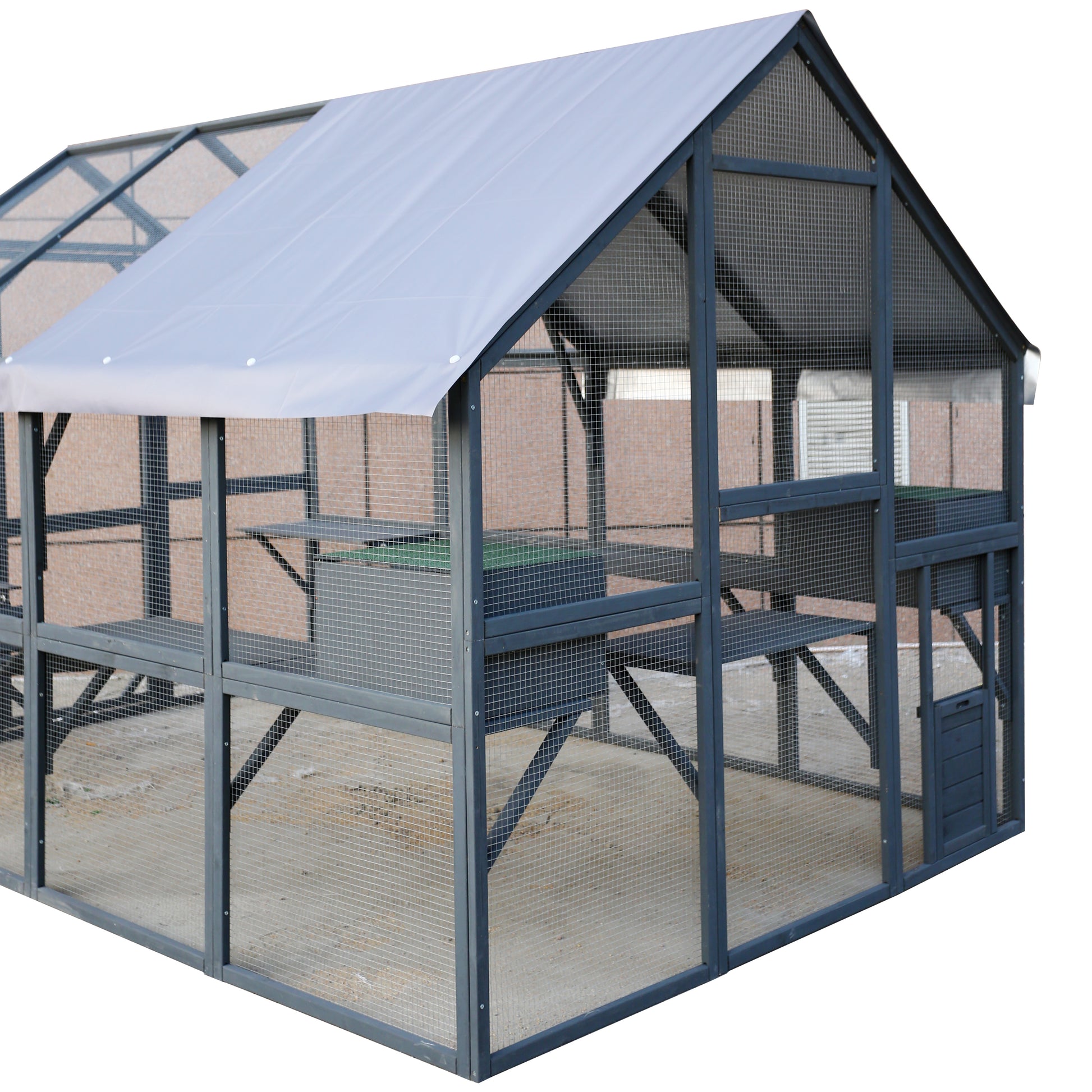 Spacious grey wooden chicken coop with multiple levels and wire mesh enclosure