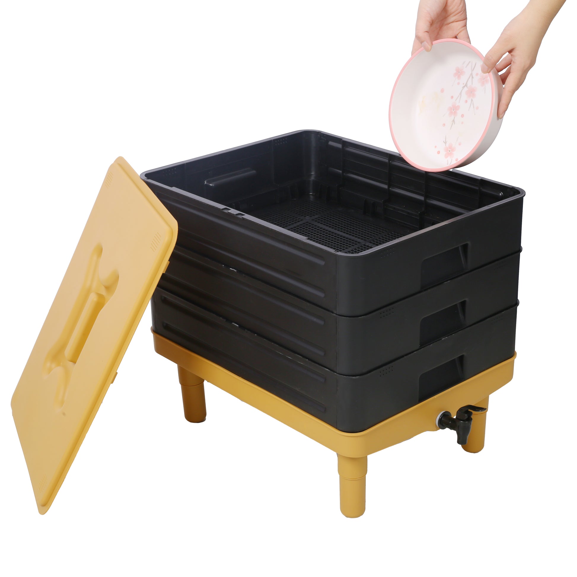 Black threetier compost bin with yellow lid and base for home vermicomposting