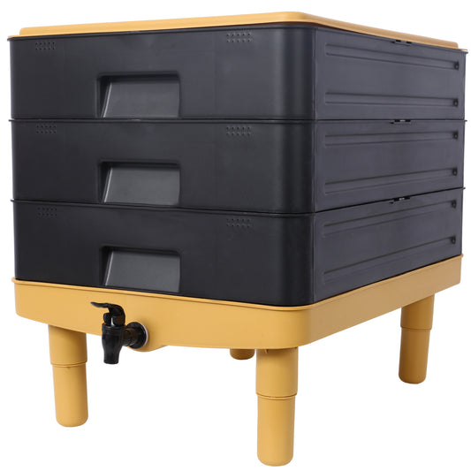 Black threetier compost bin with yellow base and spigot for composting kitchen scraps