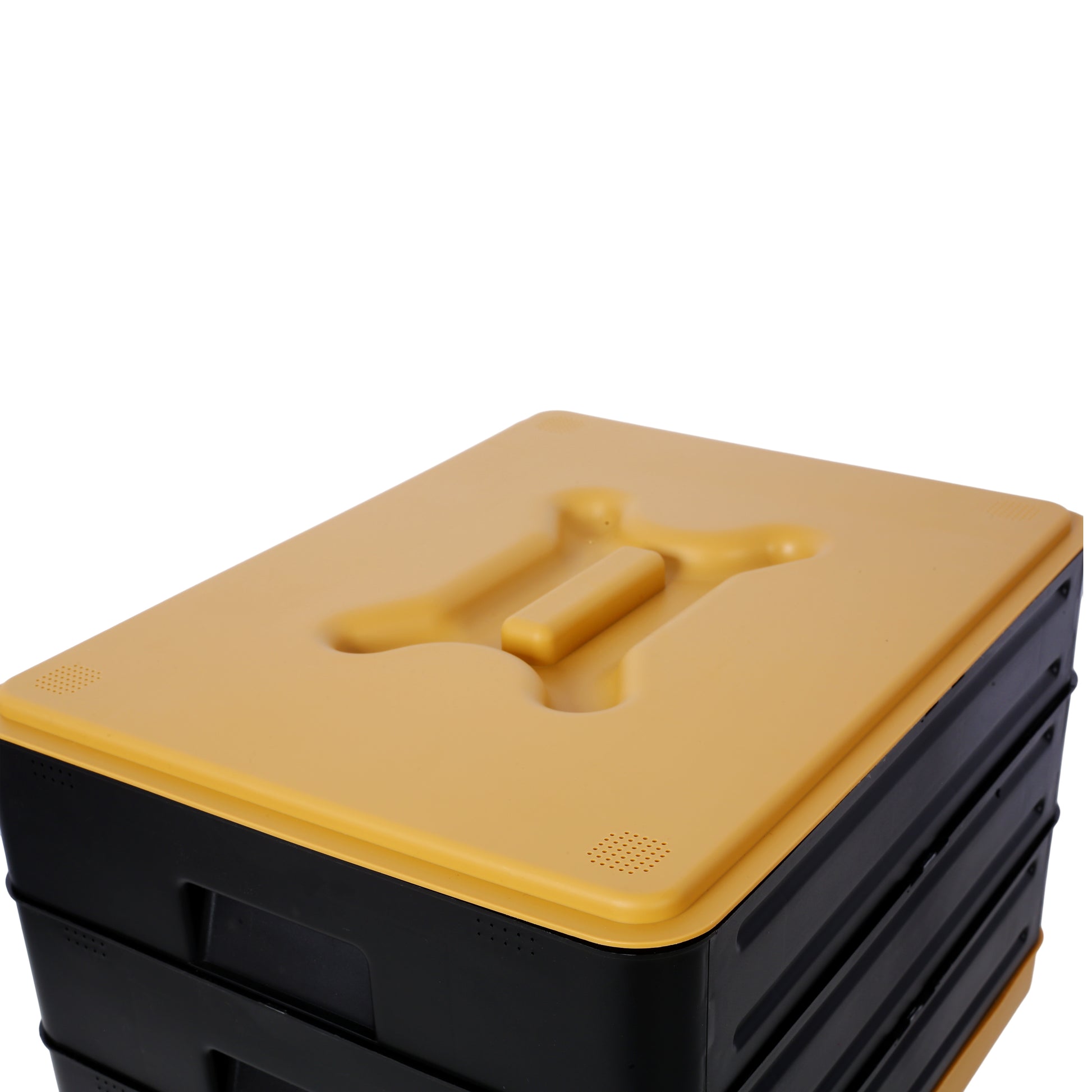 Black and yellow foldable storage bin with textured lid and integrated handle