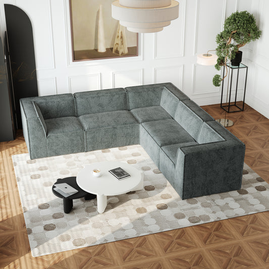 Deep grey sectional sofa with textured fabric perfect for modern living rooms