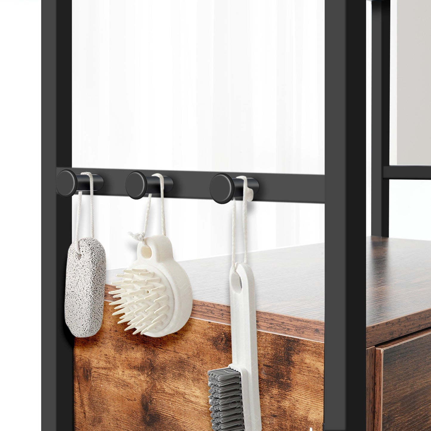 Small bathroom caddy with pumice stone loofah and cleaning brush hanging from hooks