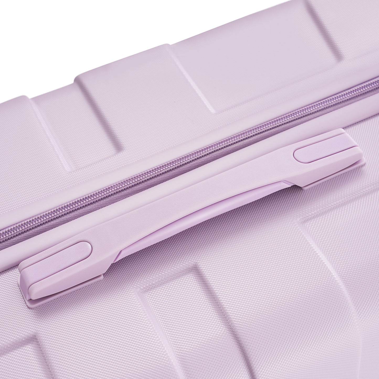 Closeup of a lilac suitcase textured shell and purple zipper detail