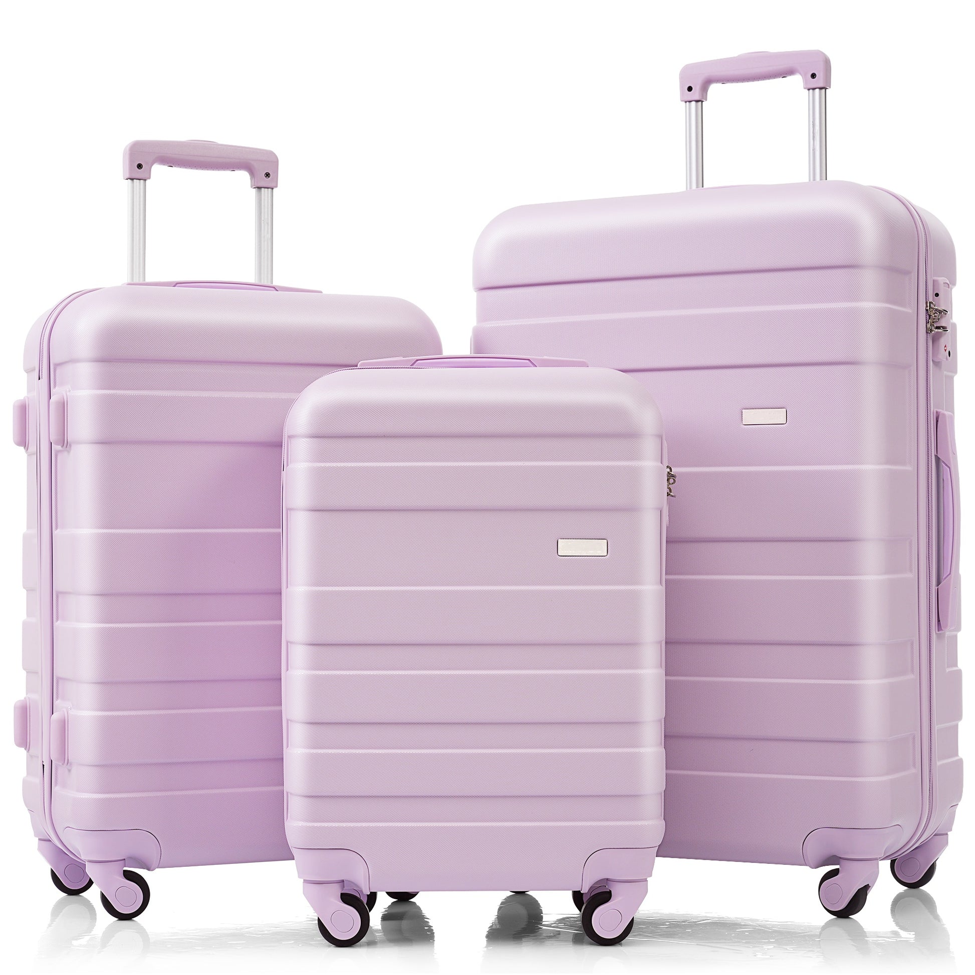 Three lavender hardshell suitcases in various sizes perfect for travel