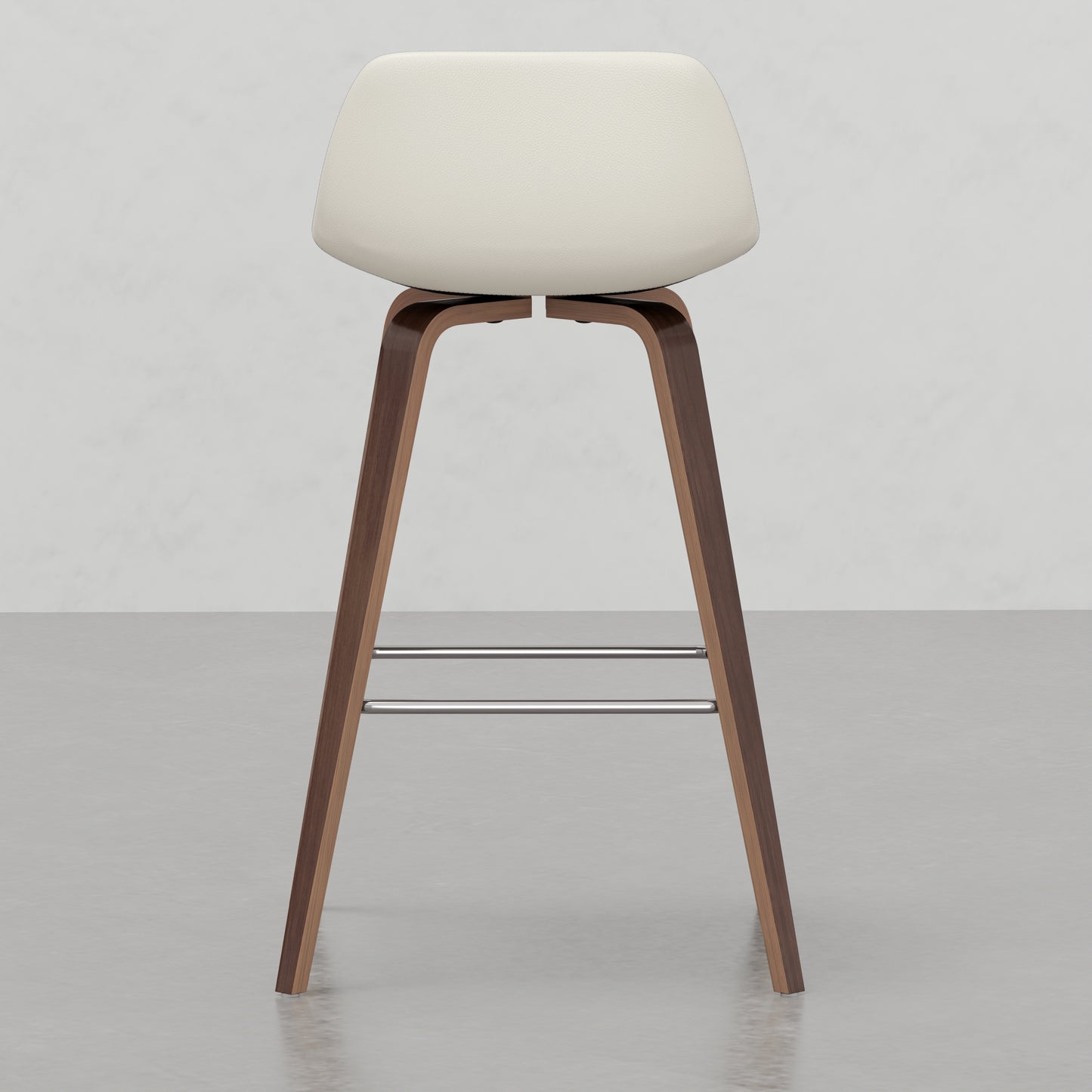 Cream upholstered swivel bar stool with curved wooden legs and chrome footrests