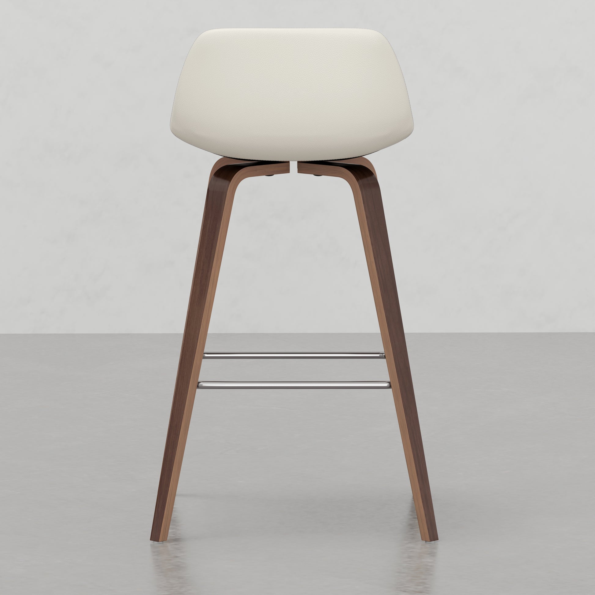 Cream upholstered swivel bar stool with curved wooden legs and chrome footrests