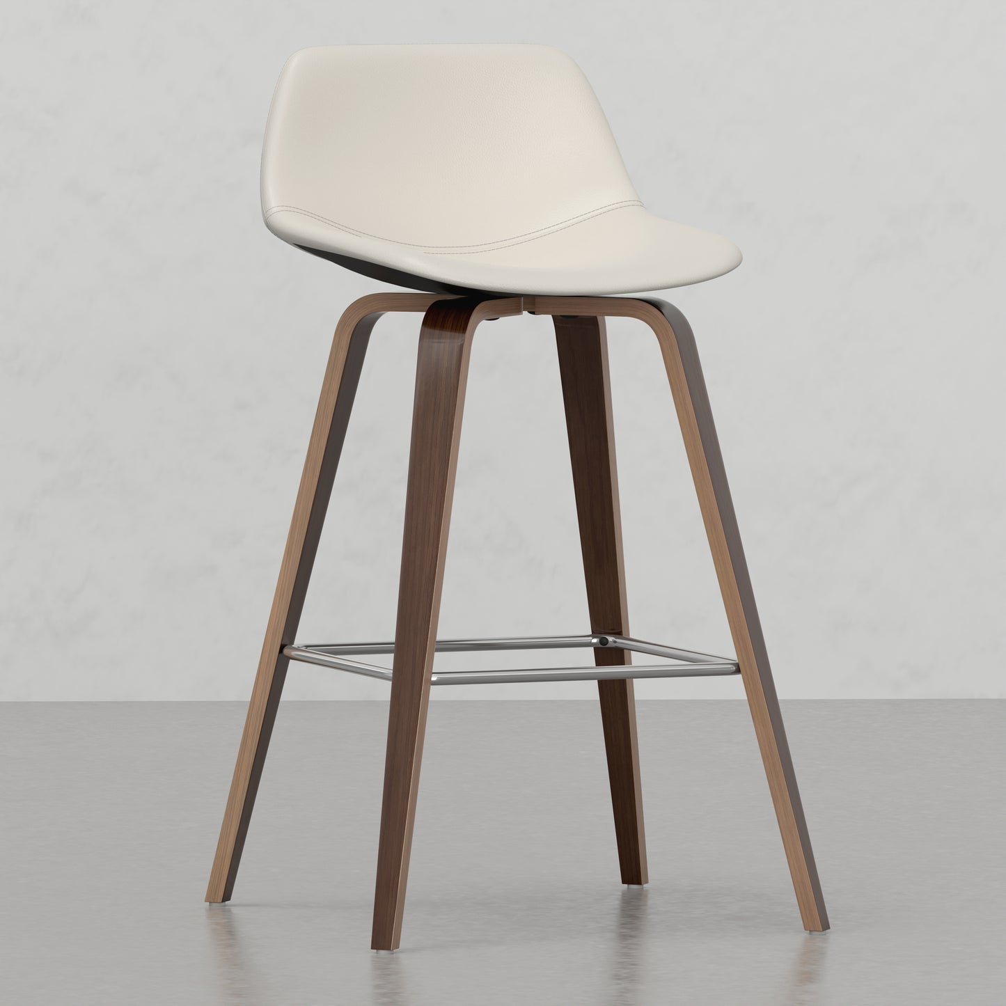 Cream leather swivel bar stool with curved walnut wood legs and metal footrest