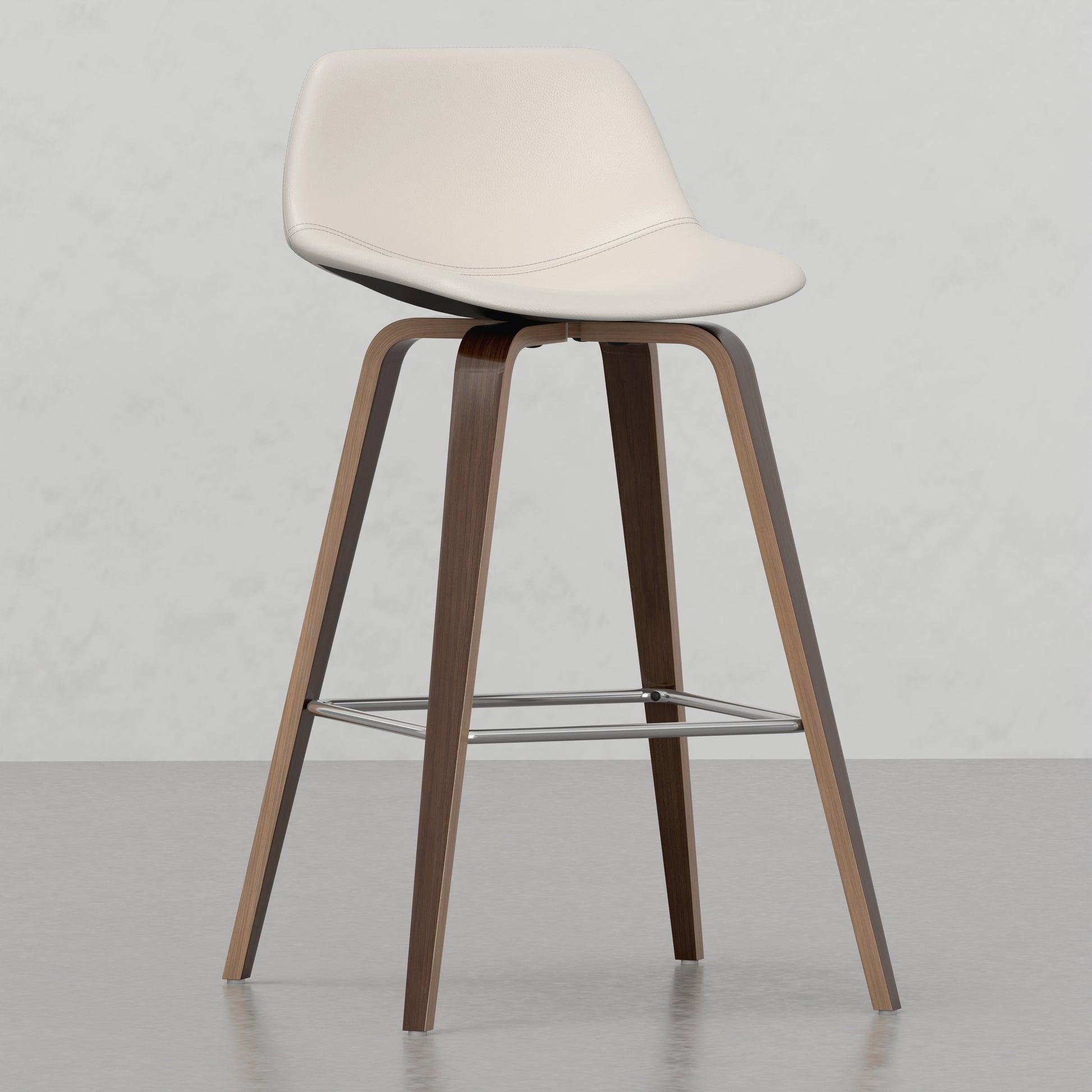 Cream leather swivel bar stool with curved walnut wood legs and metal footrest