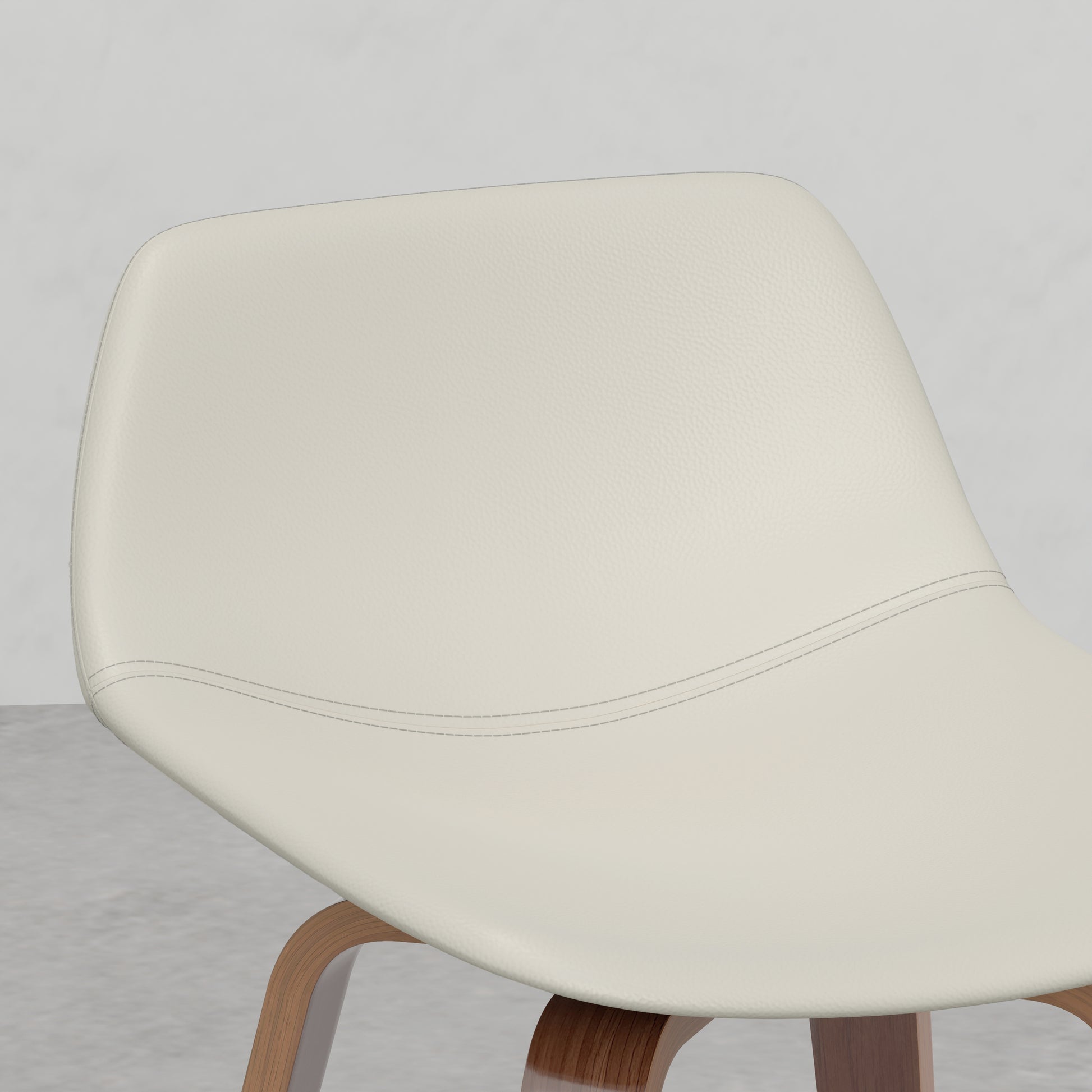 Cream leather modern accent chair with curved wooden base