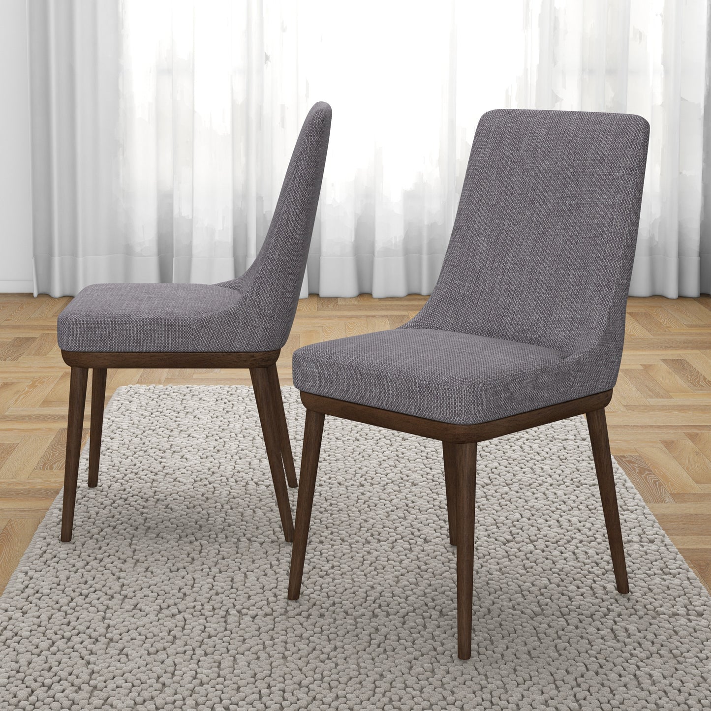 Grey fabric dining chair with dark wood legs and a textured weave