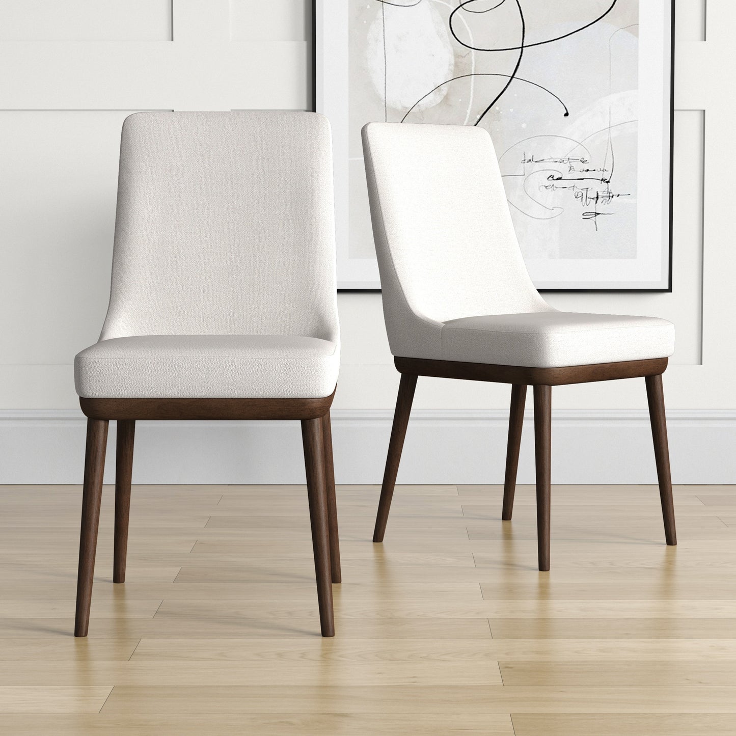 Two upholstered dining chairs in cream white with dark wood legs