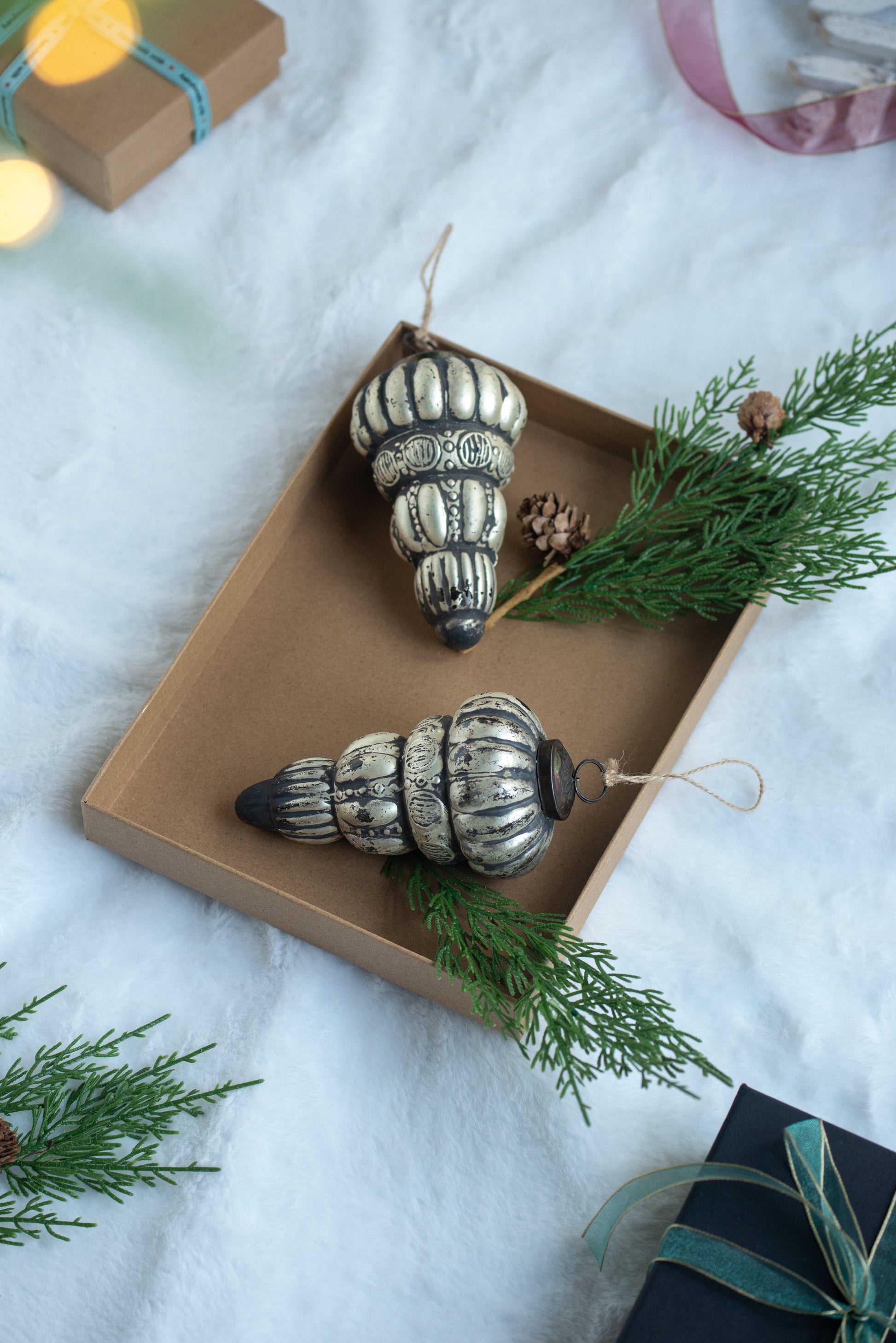 Antique silver pinecone christmas ornament with intricate details festive decor