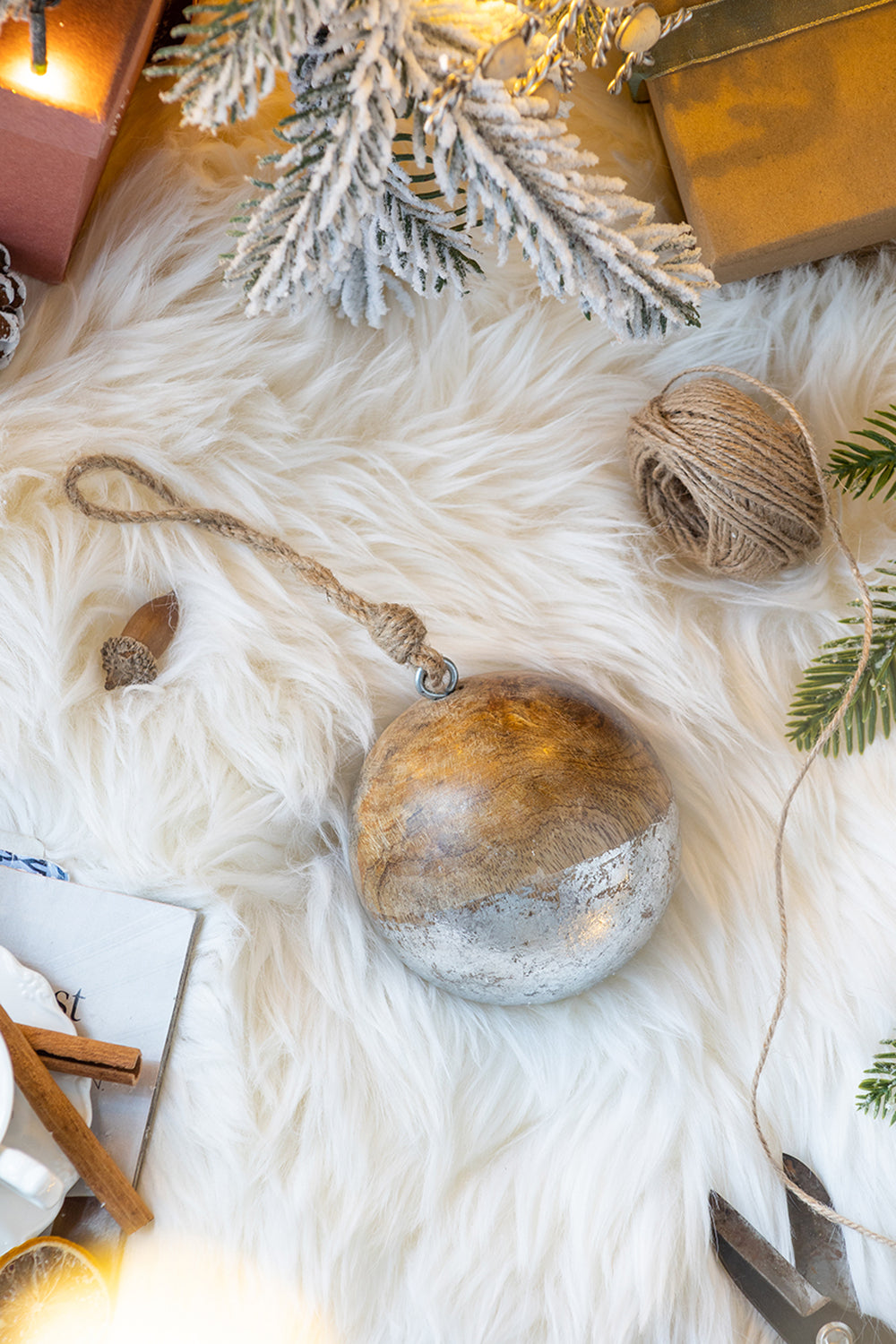 Wooden Christmas bauble with silver accent and jute hanger