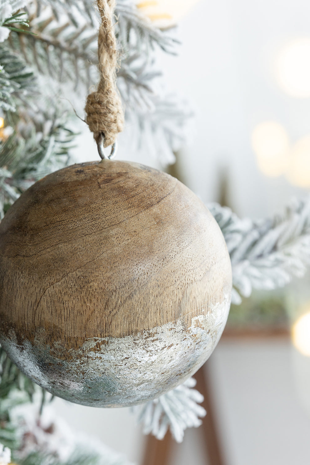 Rustic wooden Christmas ornament with distressed silver base