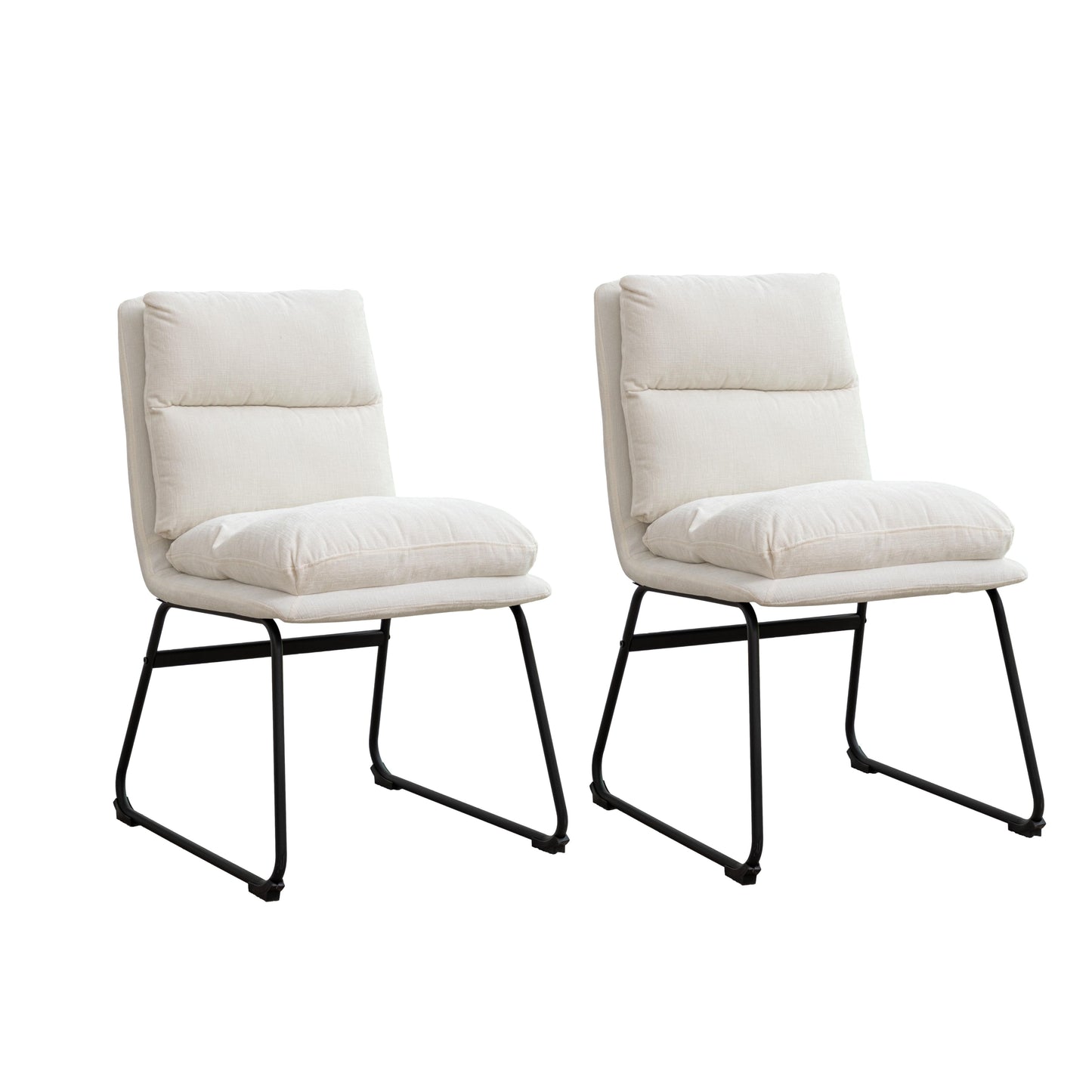 Two cream fabric accent chairs with black metal legs
