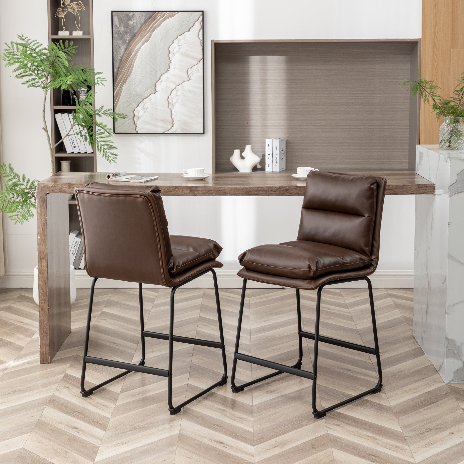 Two brown faux leather bar stools with black metal legs modern design for kitchen island