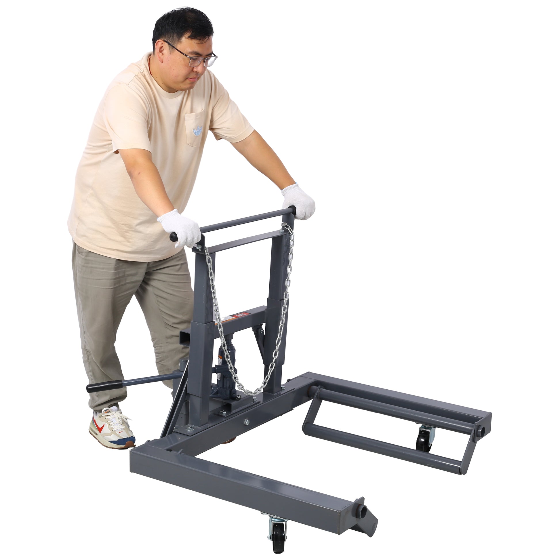 Gray manual transmission jack with a steel frame and chains operated by a person