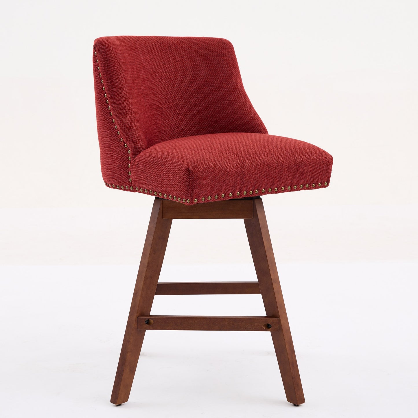 Red fabric swivel bar stool with nailhead trim and wooden legs