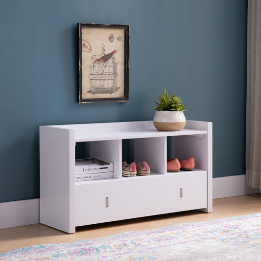 White shoe storage bench with two open cubbies holding shoes and a drawer