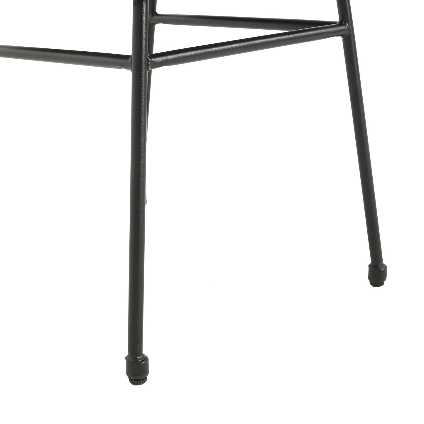 Closeup of black metal hairpin legs with protective caps for furniture stability