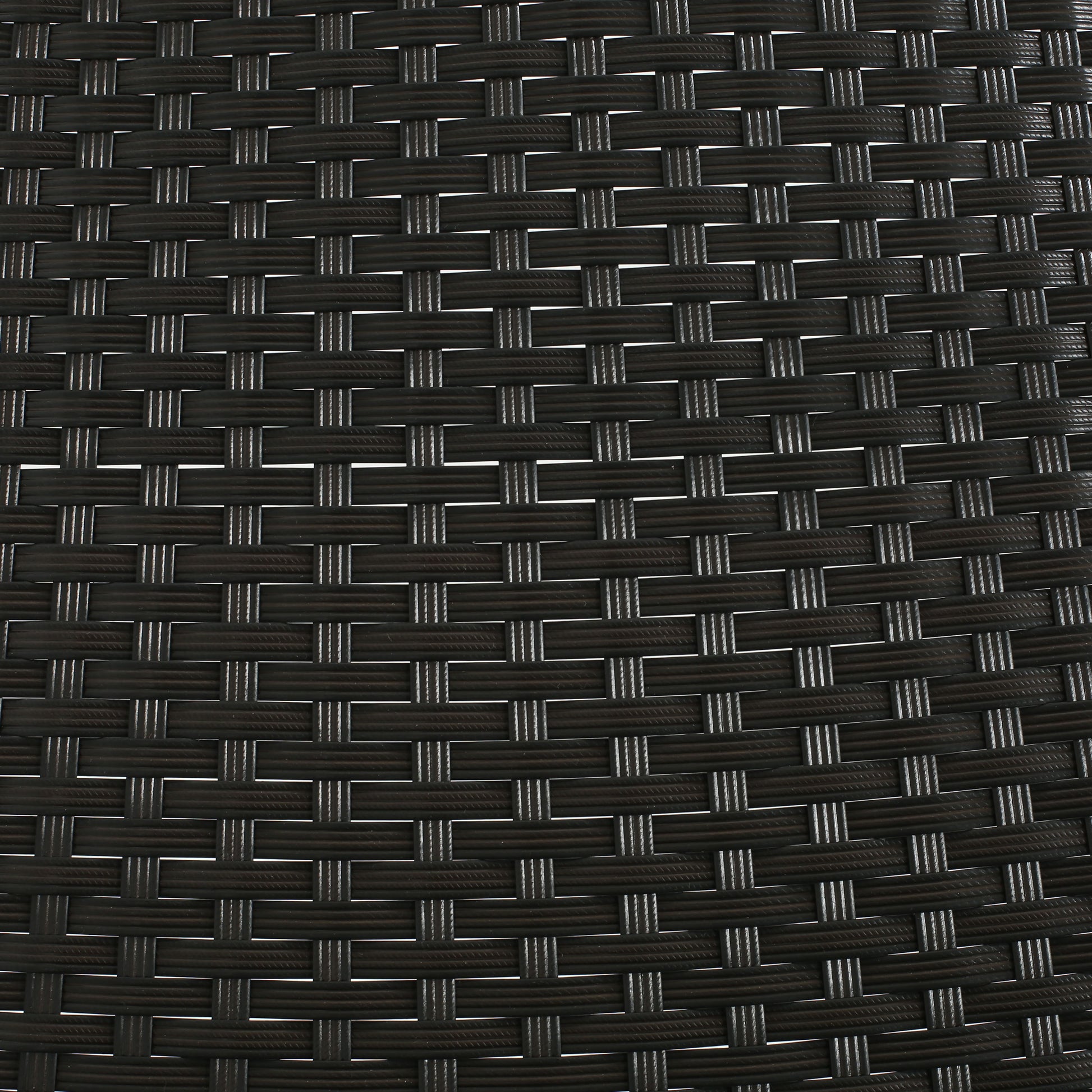 Closeup of dark brown woven rattan texture ideal for outdoor furniture