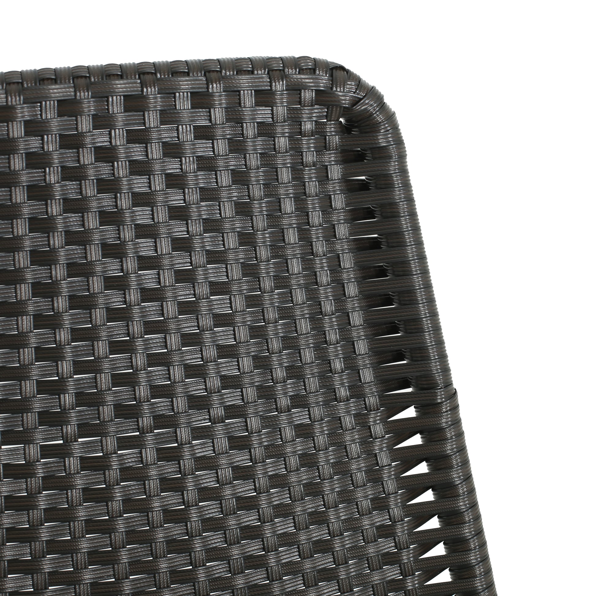 Dark brown wicker weave detail on an outdoor chair showcasing texture