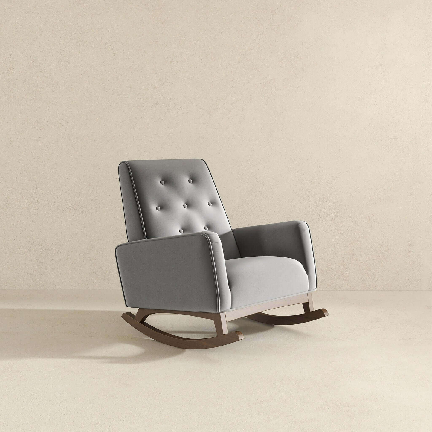 Tufted gray velvet upholstered rocking chair with dark wood base