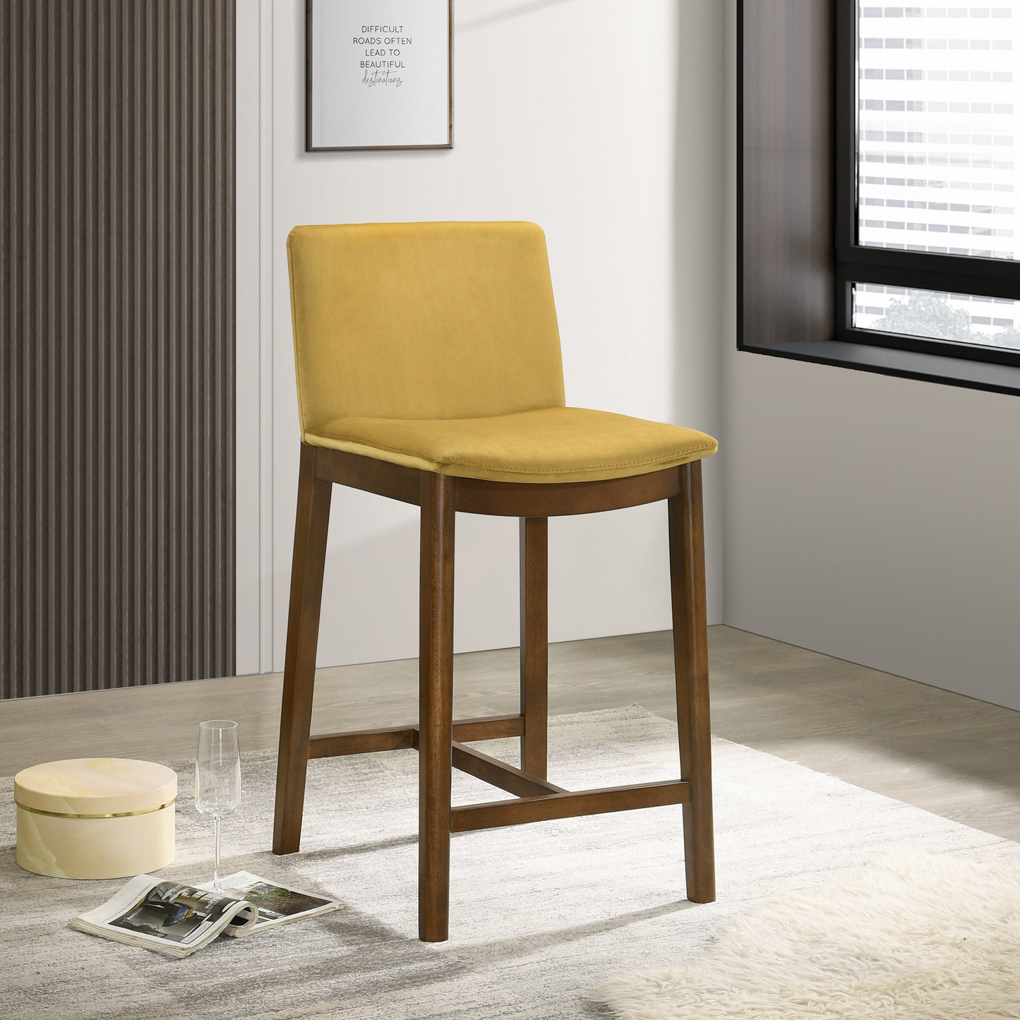 Yellow upholstered bar stool with dark wood frame and legs