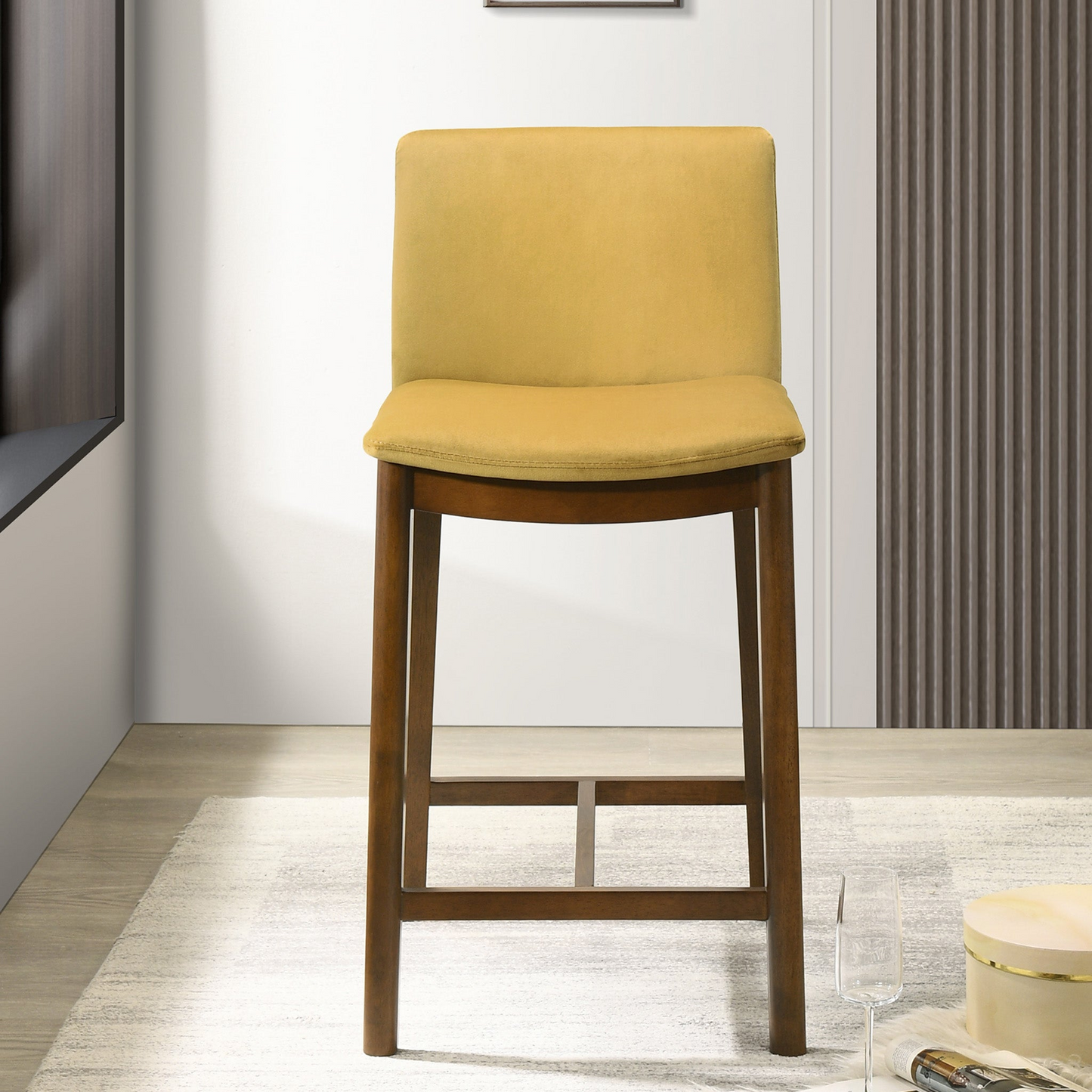 Mustard yellow upholstered bar stool with wooden legs