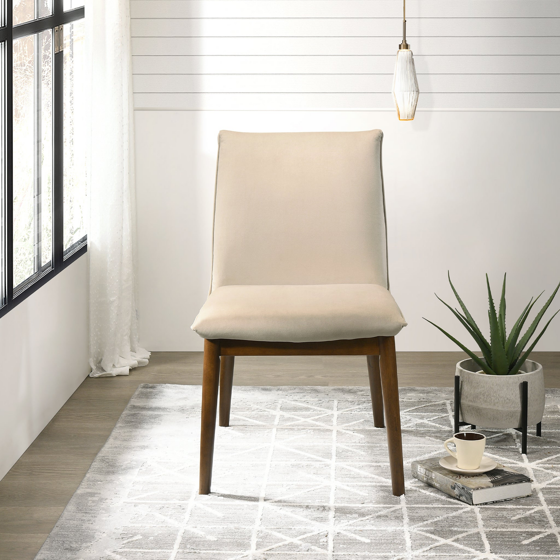 Modern beige upholstered dining chair with walnut legs perfect for contemporary kitchens