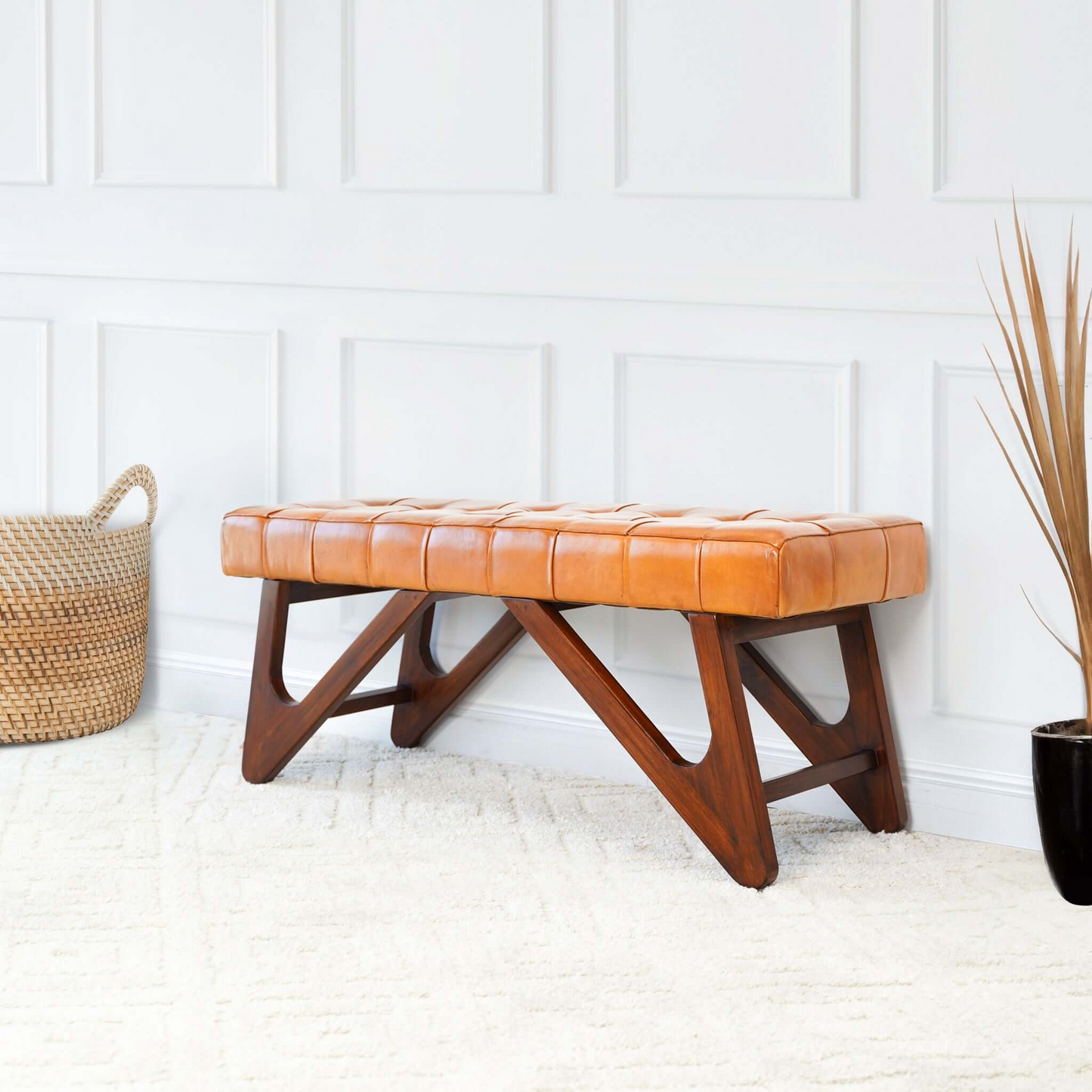 Tufted cognac leather bench with dark wood frame perfect for entryway or living room seating
