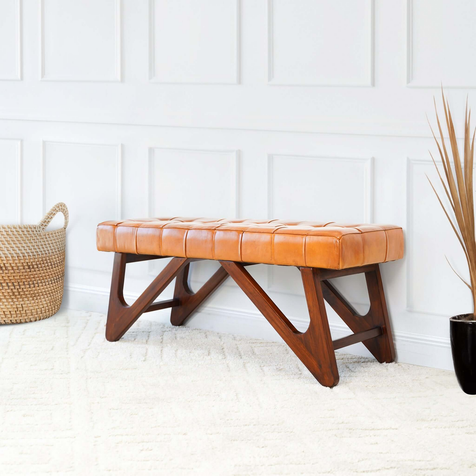 Tufted cognac leather bench with dark wood frame perfect for entryway or living room seating