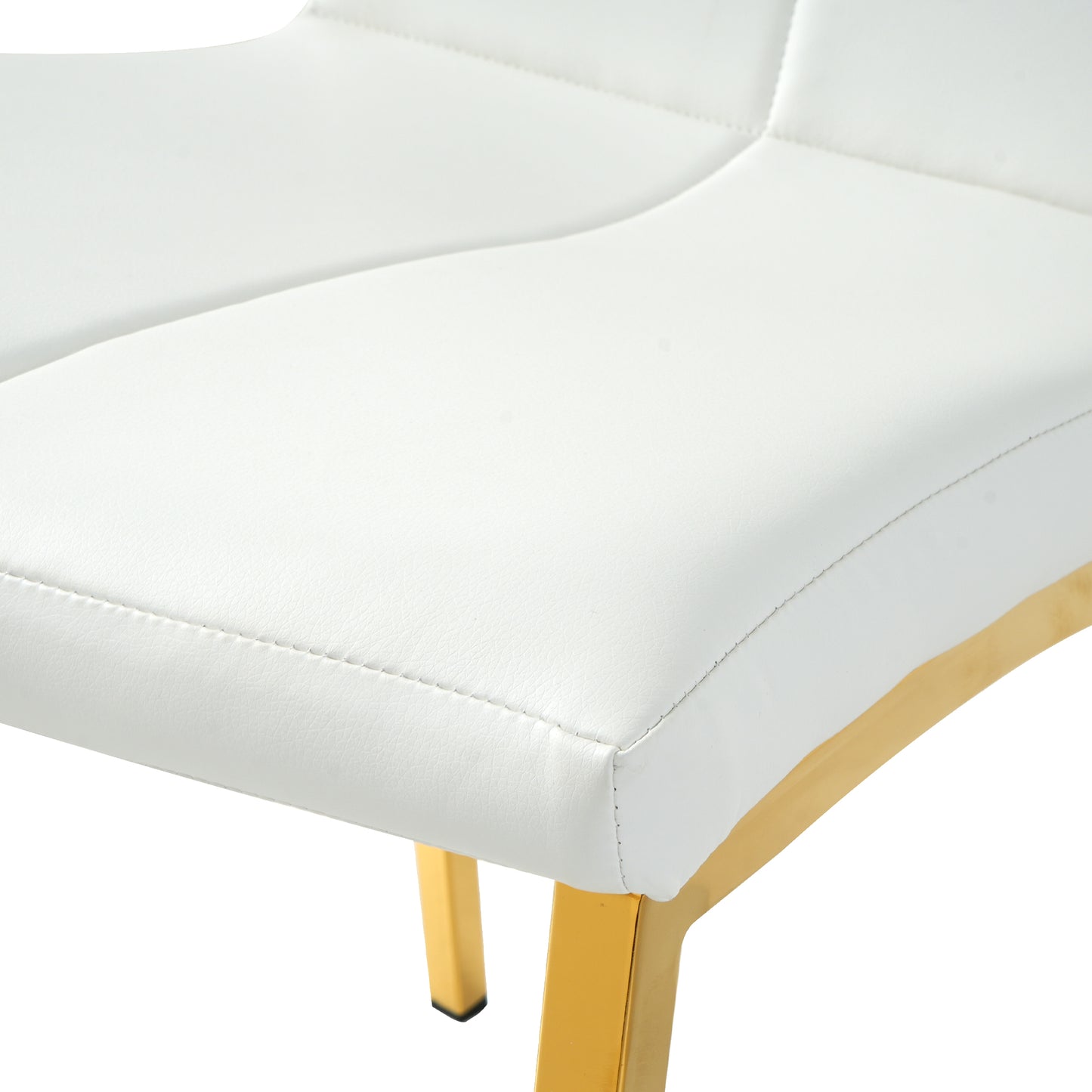 Closeup of a white upholstered bench seat with gold metal legs featuring clean stitching details for a modern look