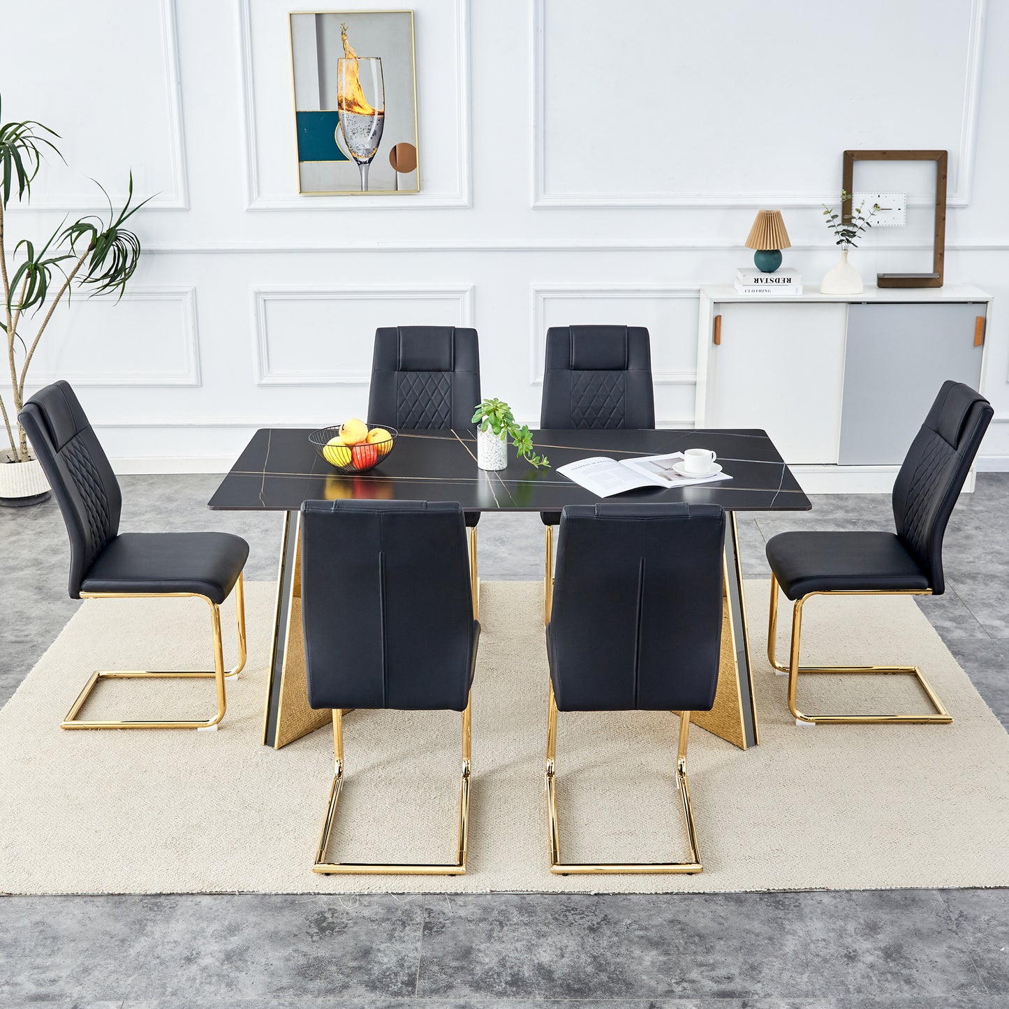Modern black dining chairs with gold cantilever legs and quilted backrests