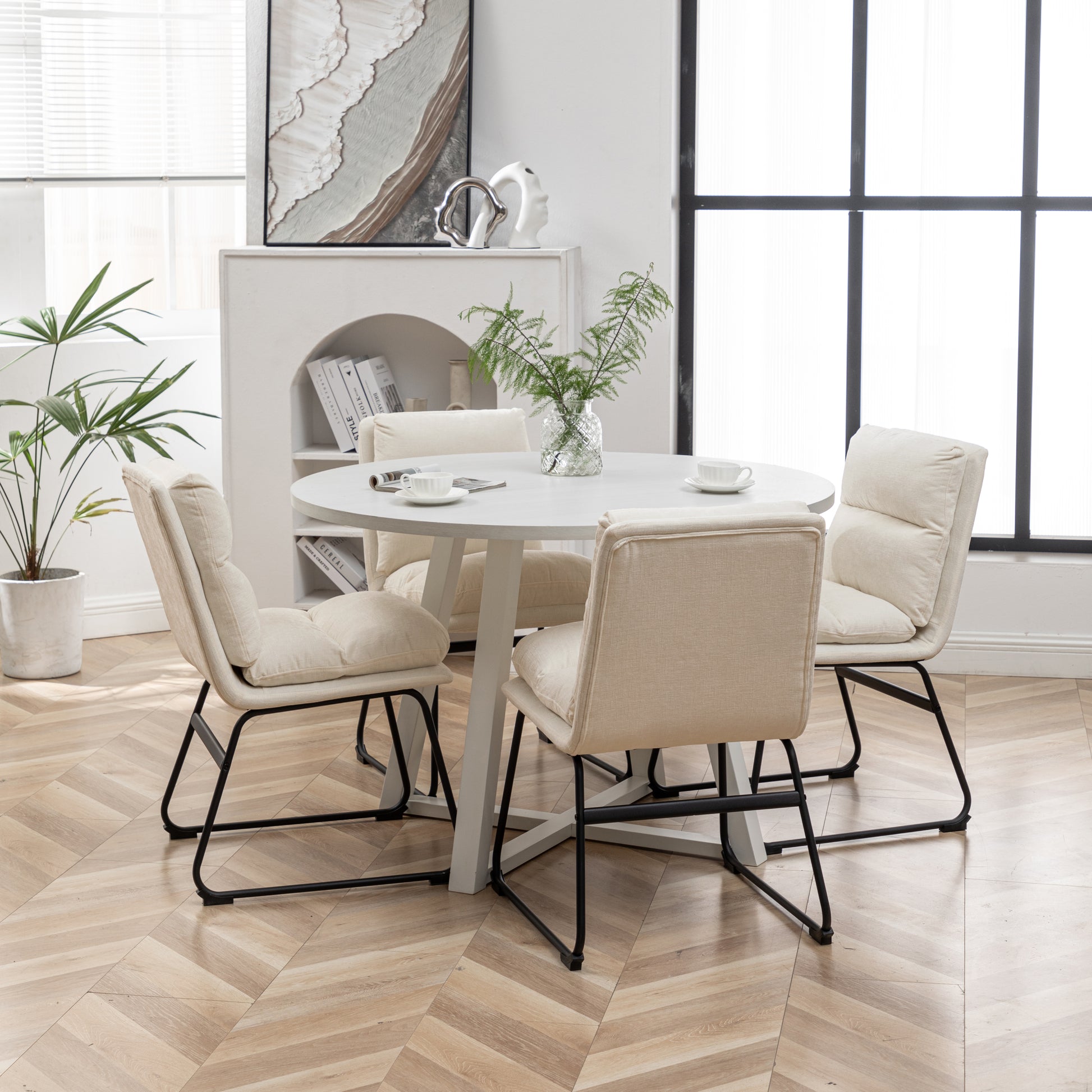 Plush cream dining chair with black metal legs comfortable and modern for any home