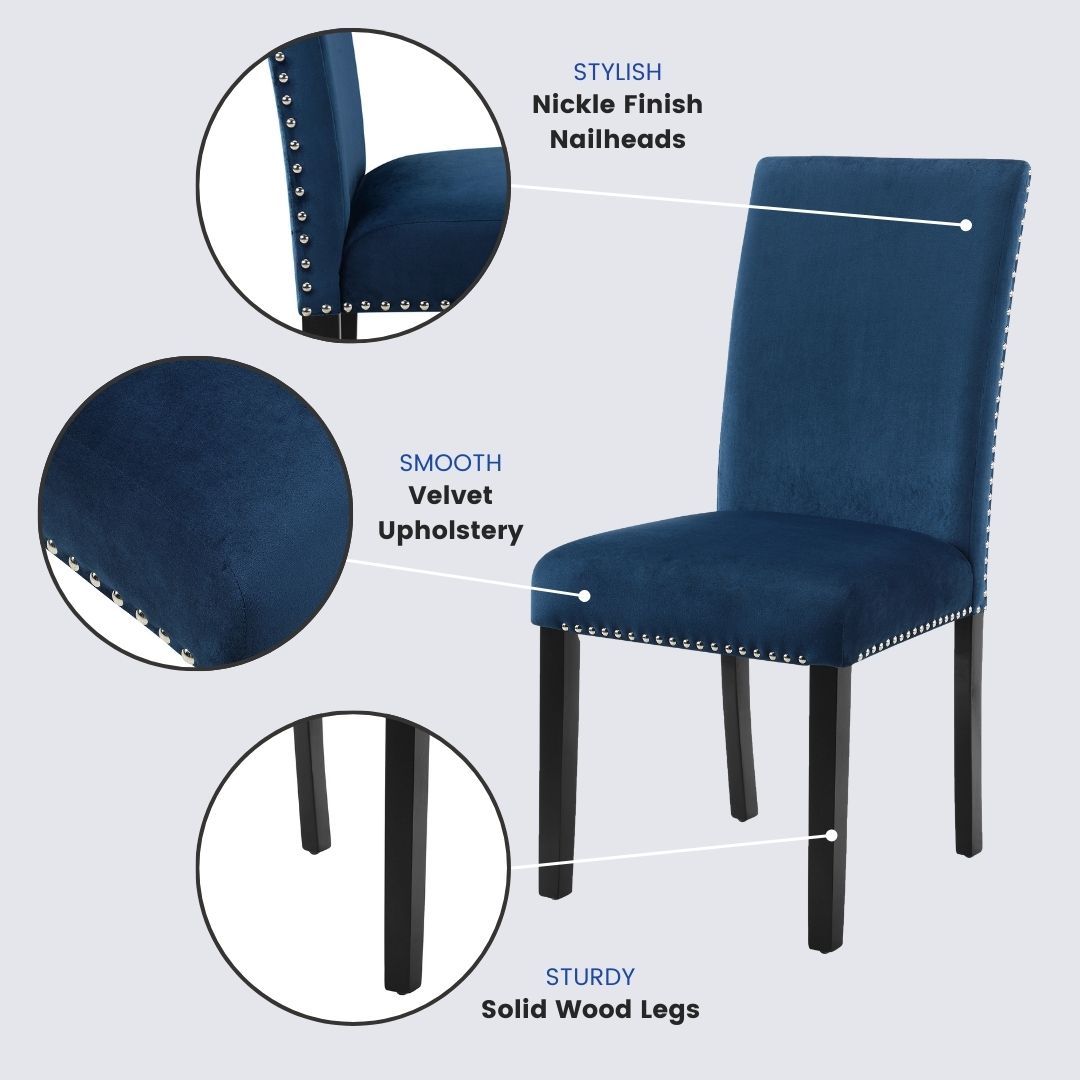 Navy velvet dining chair with nickel nailhead trim and sturdy wood legs