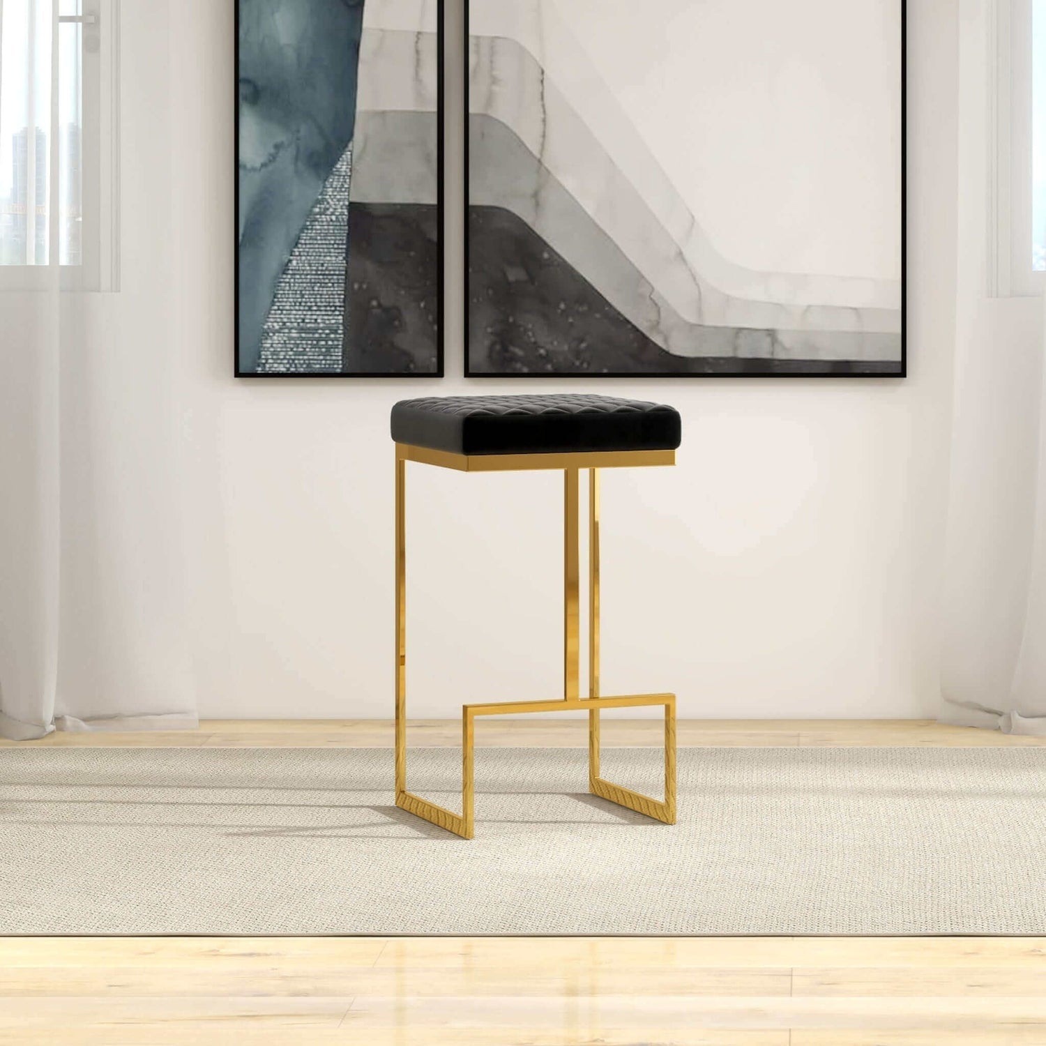 Black velvet tufted bar stool with a gold geometric metal frame and footrest