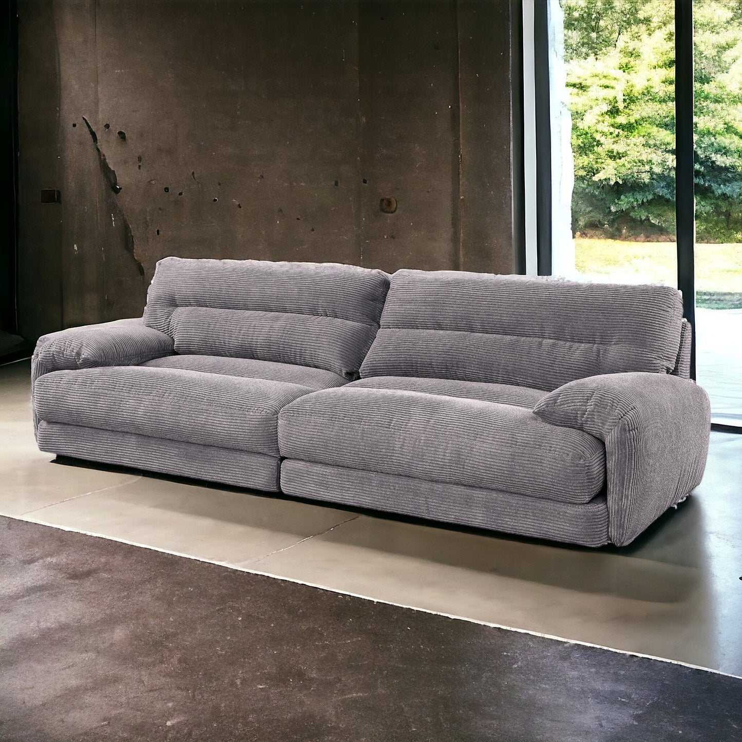 Comfortable grey corduroy sofa with plush cushions perfect for modern living rooms