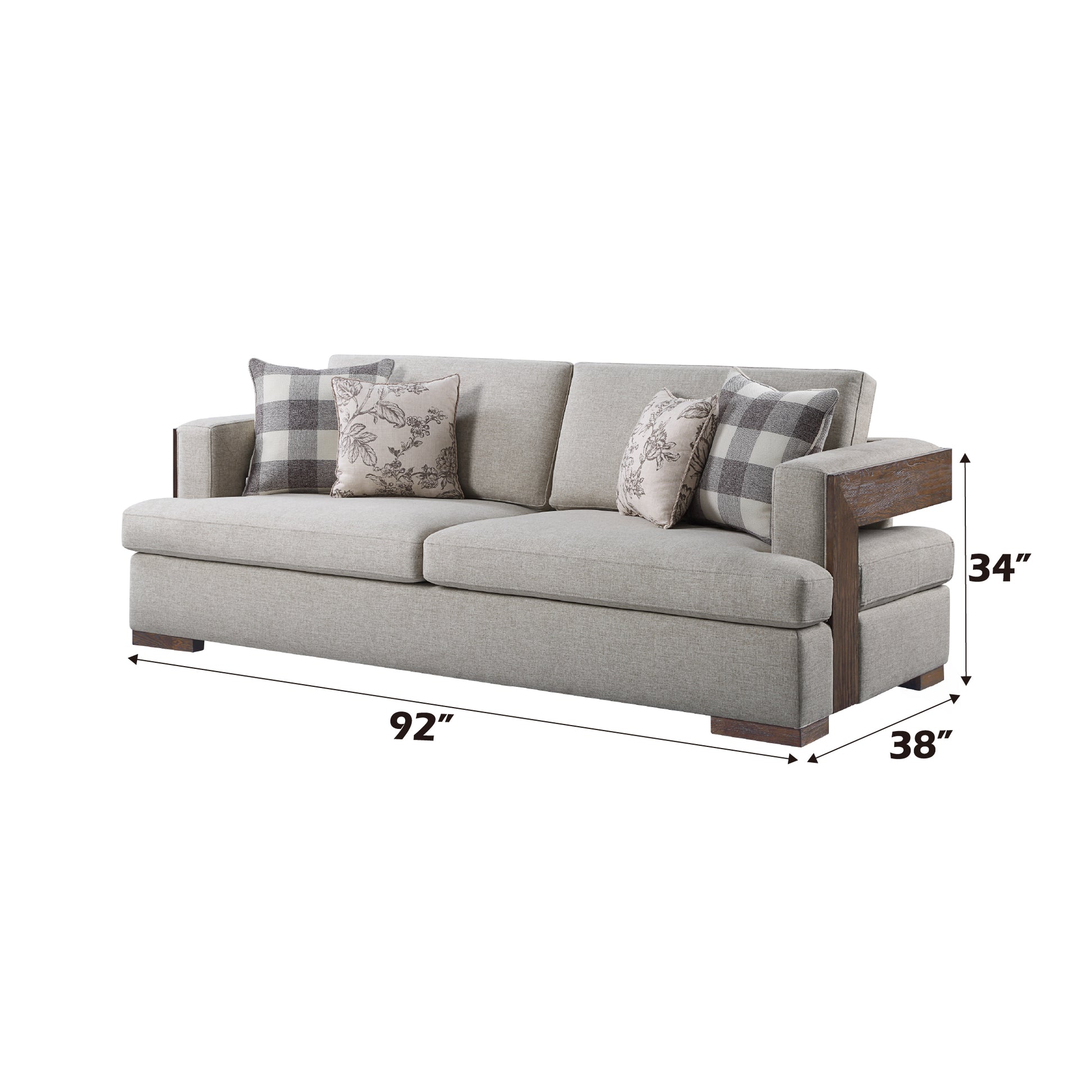 Modern gray fabric sofa with contrasting wooden arm accents and patterned throw pillows