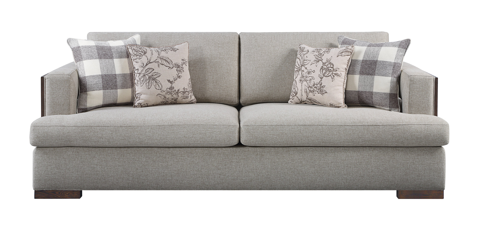 Textured light grey fabric sofa with accent pillows featuring plaid and floral patterns