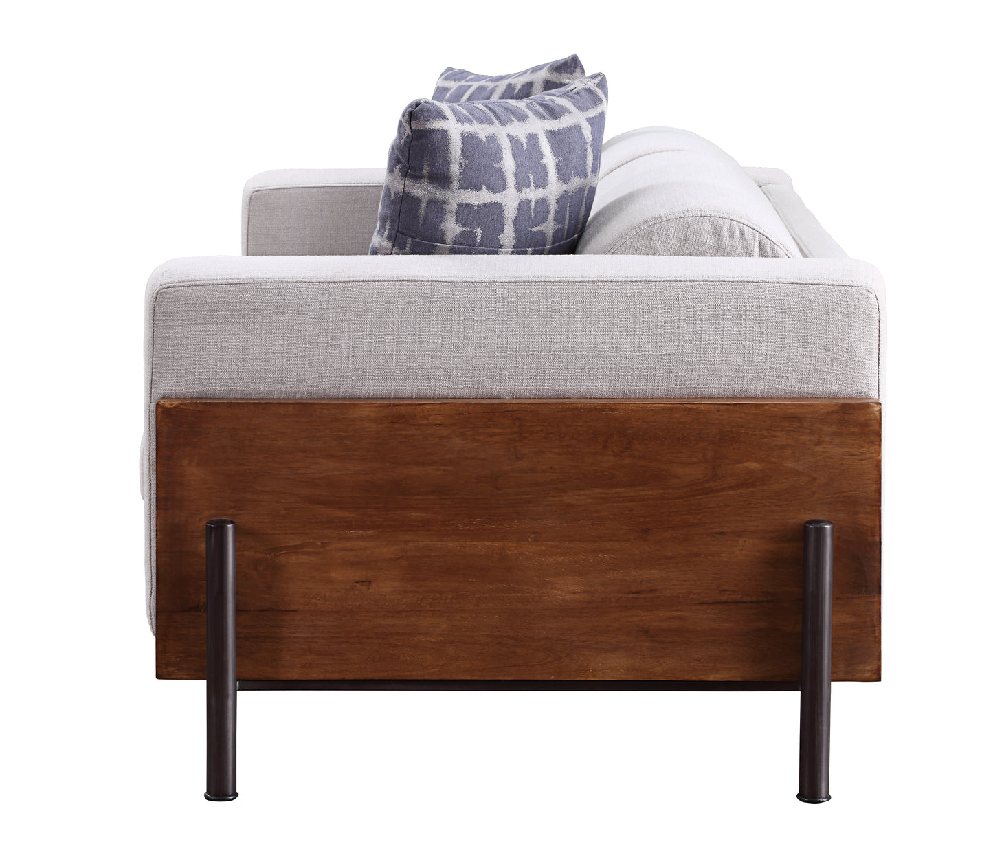 Modern gray fabric sofa with patterned blue and white throw pillows and a warm wood base
