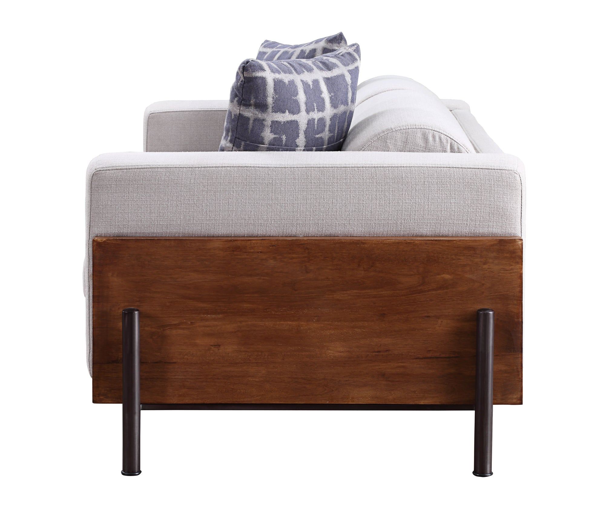 Modern gray fabric sofa with patterned blue and white throw pillows and a warm wood base