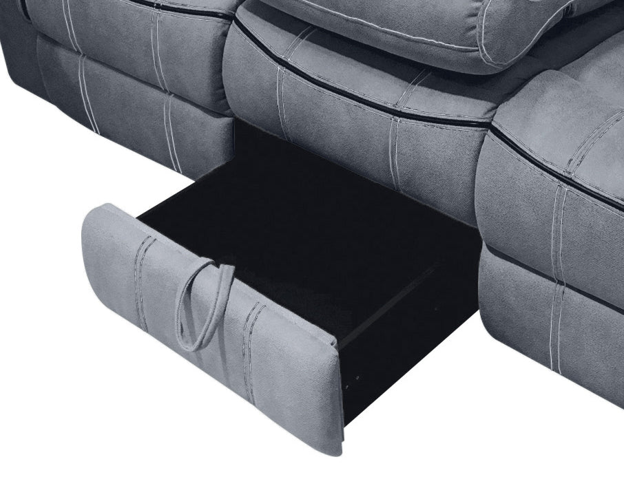 Gray sectional sofa with an extended storage ottoman featuring a pull loop