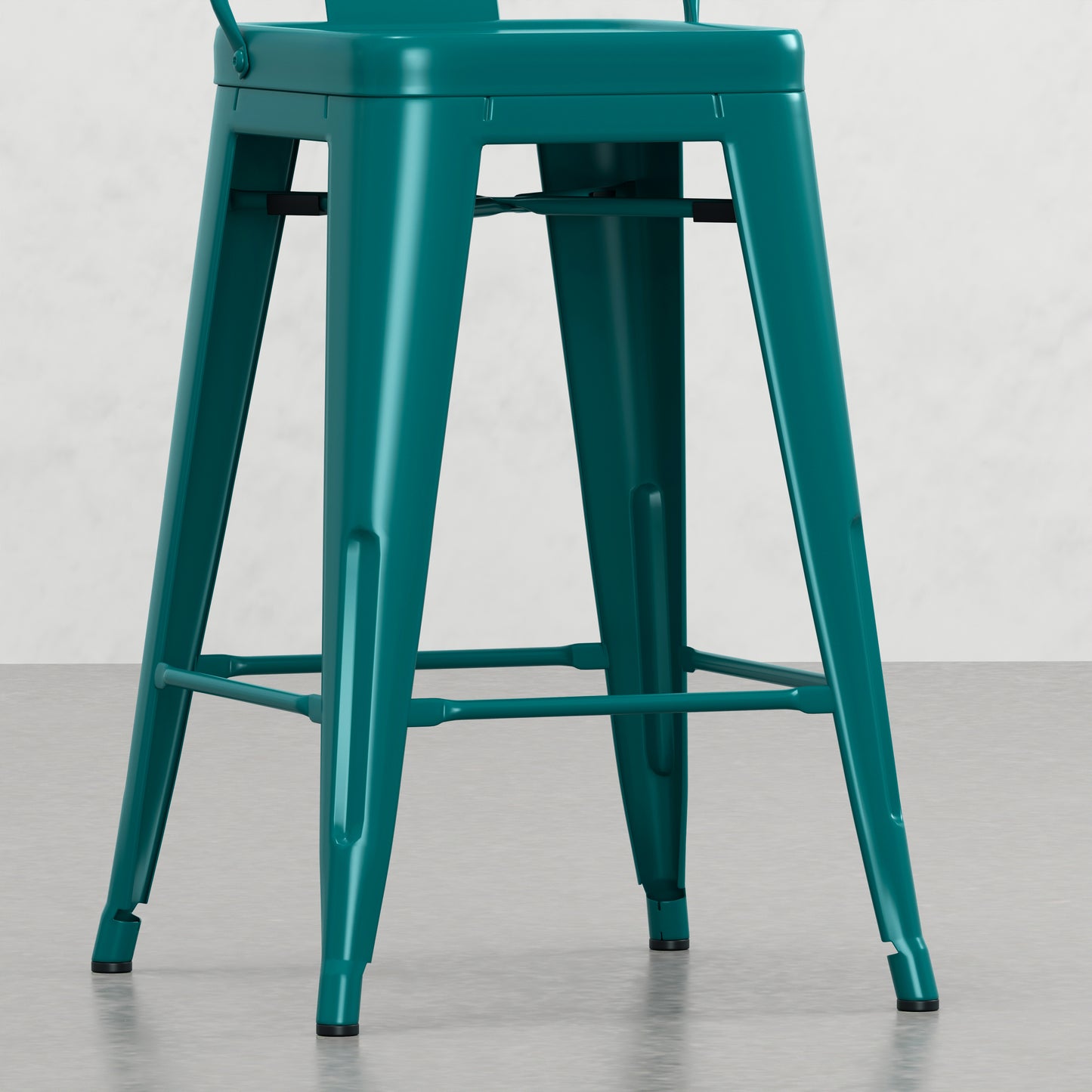 Teal metal bar stool with a backrest and footrest