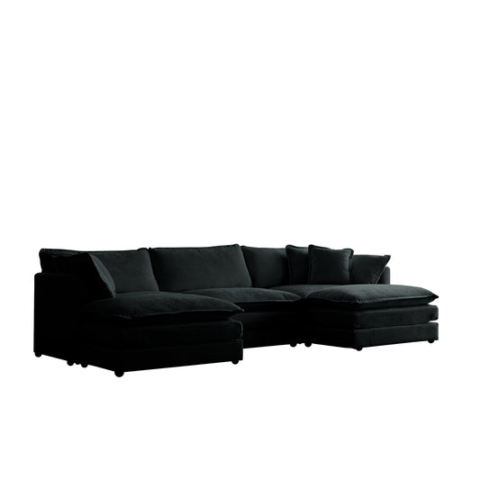 Plush black sectional sofa with deep cushions and a chaise lounge section for ultimate relaxation