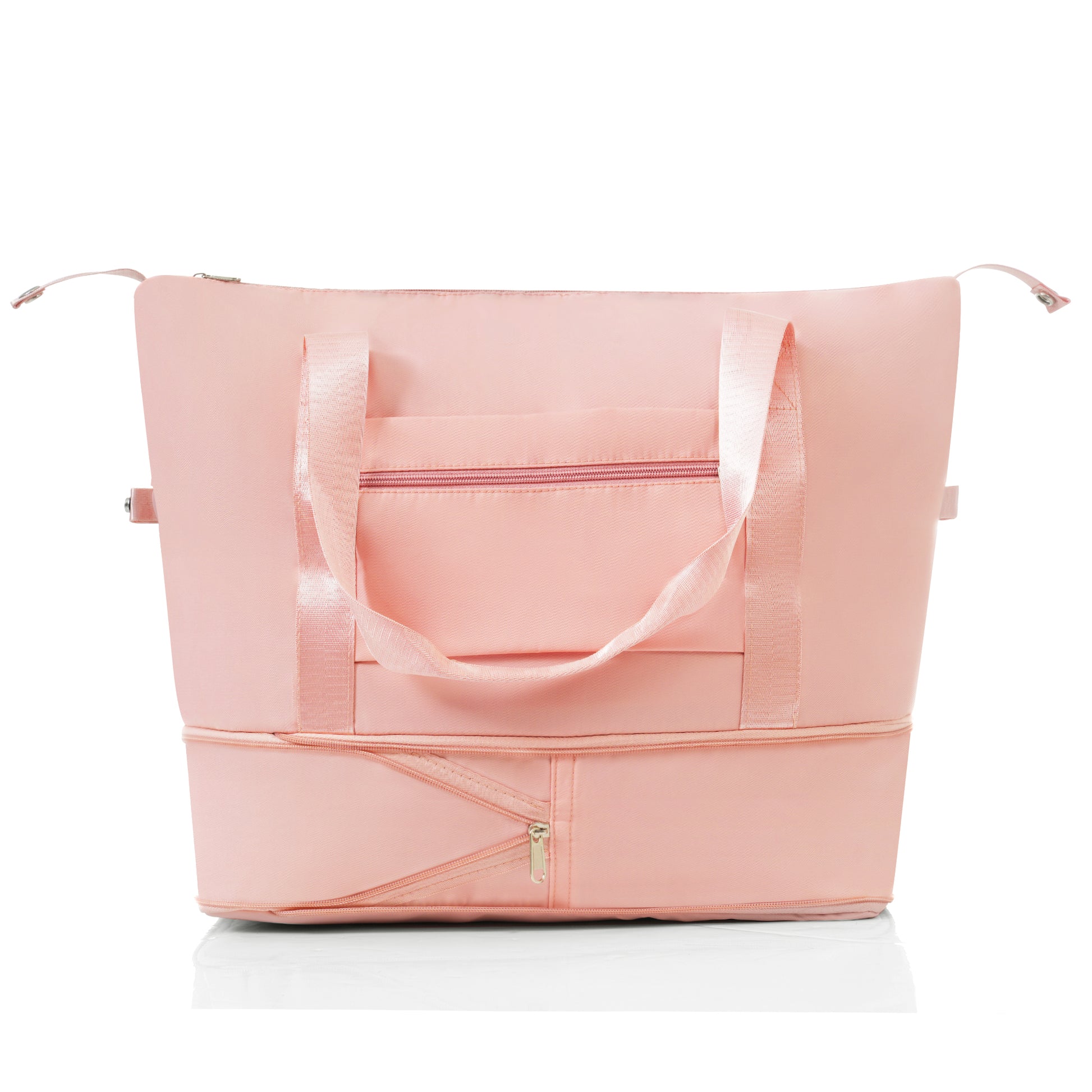 Pale pink duffel bag with zippered compartments and dual handles perfect for travel