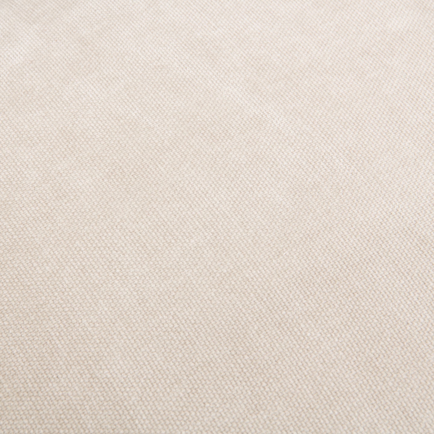 Closeup of woven beige fabric texture with a subtle diamond pattern perfect for upholstery